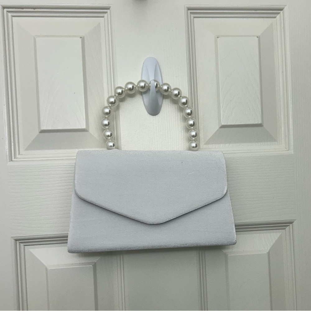 Elegant White Pearl Handle Clutch